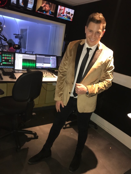 A behind the scenes shot of Josh about to go on air to cover the Academy Awards 2018 on talkRADIO